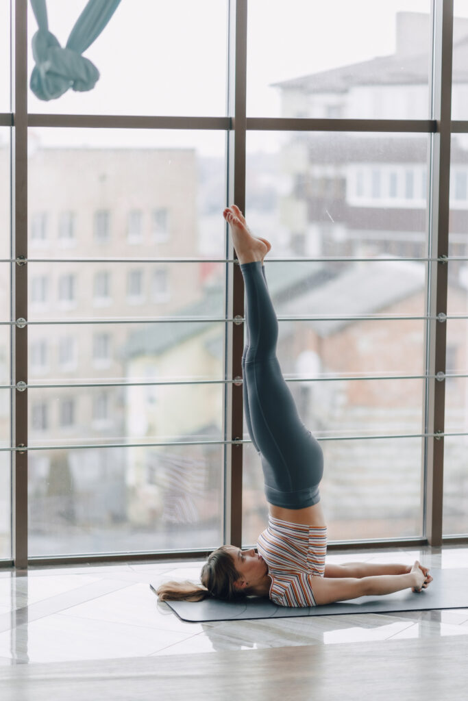 Pacticing Sarvangasana